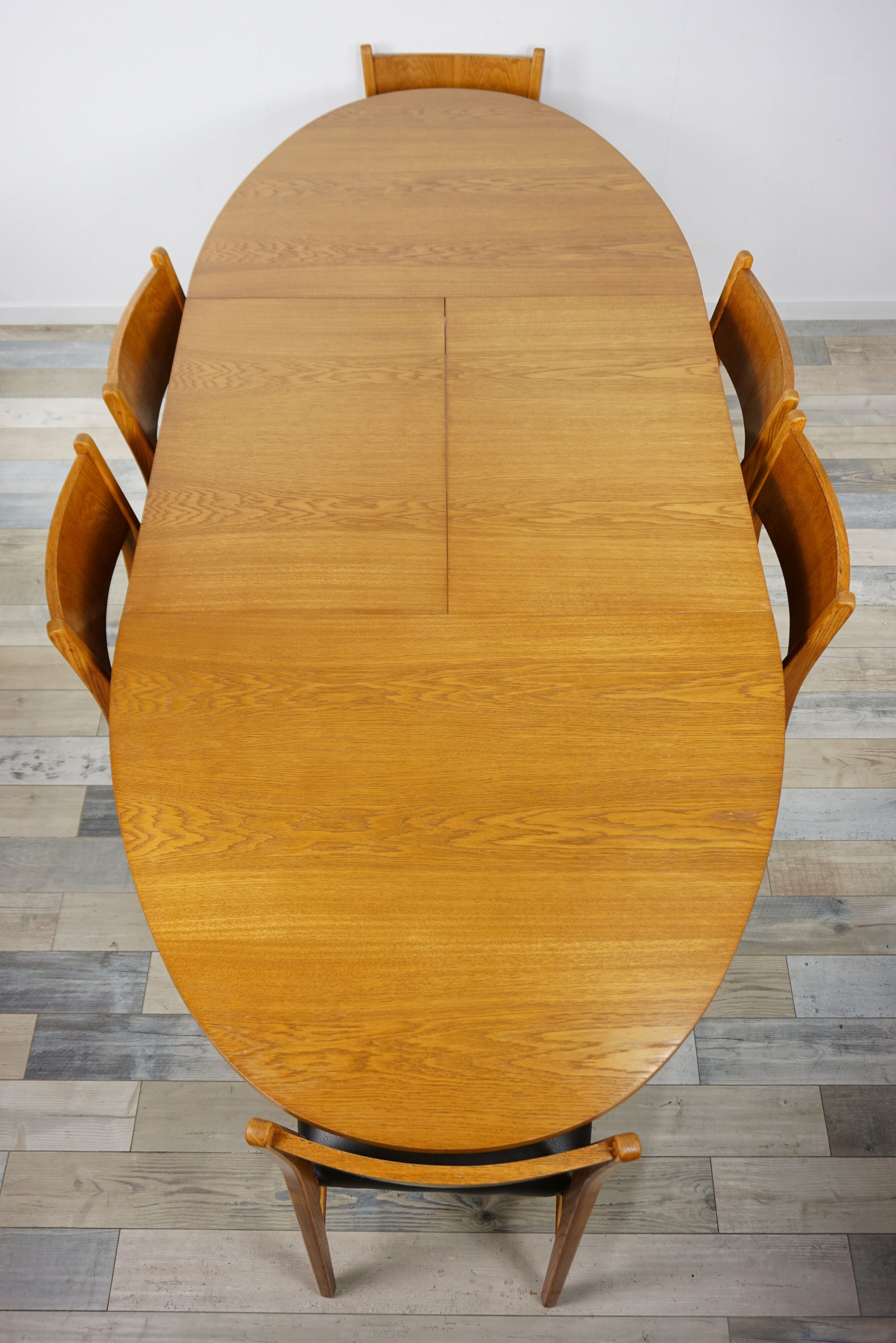Wooden oval table and 6 matching chairs 60
