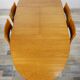 Wooden oval table and 6 matching chairs 60