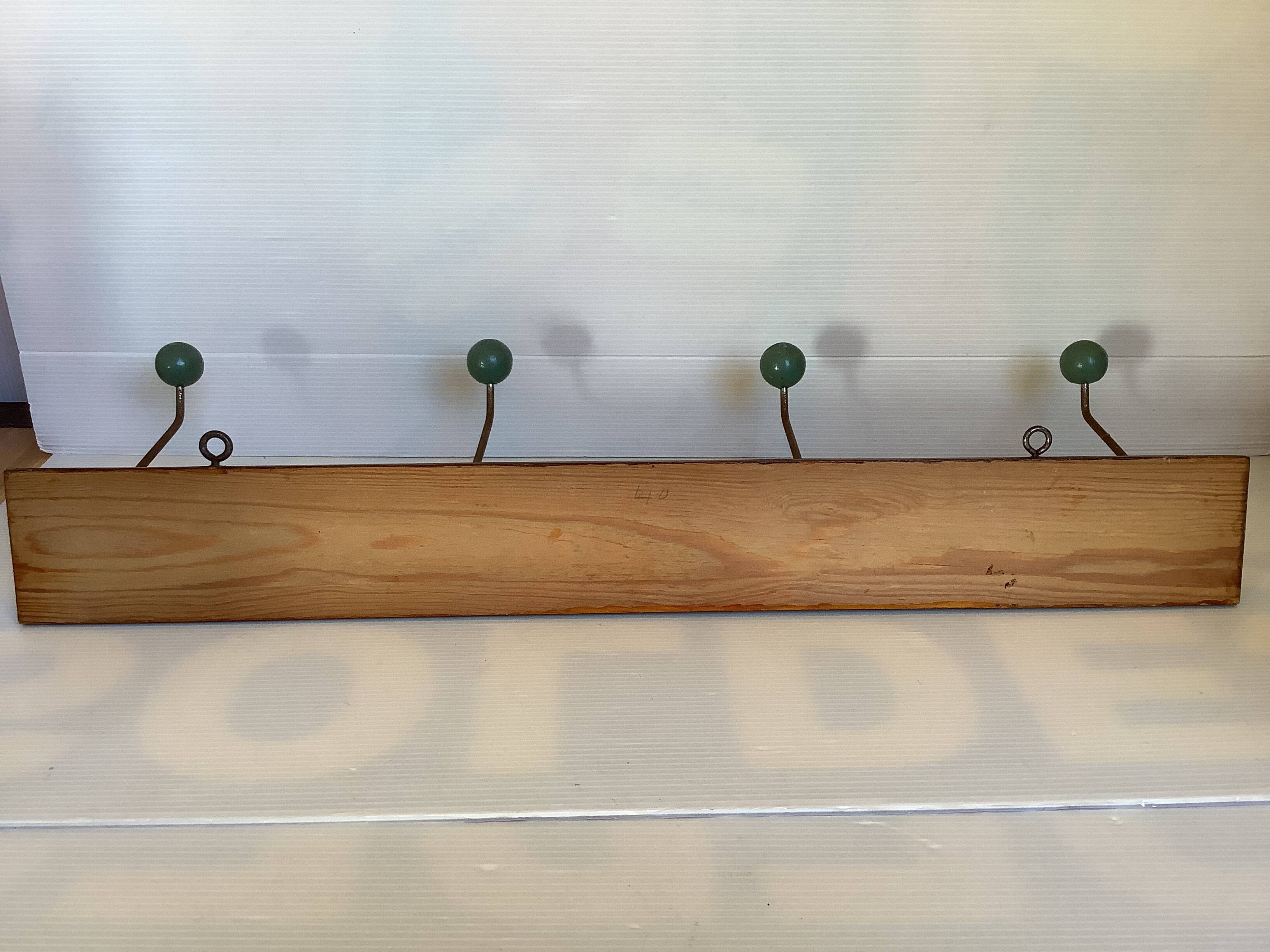 Old coat rack green balls wood metal