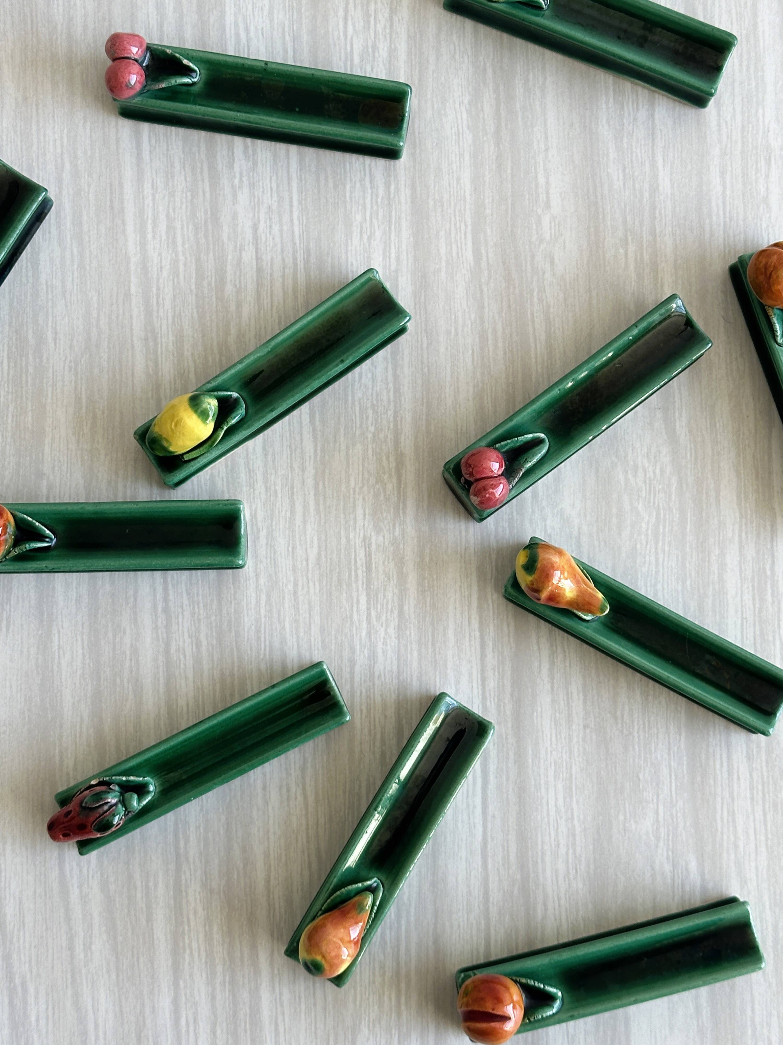 12 ceramic fruit knife holders.