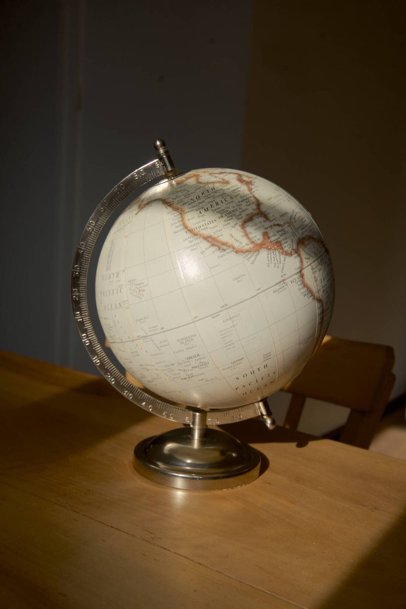 Vintage terrestrial globe on a metal stand