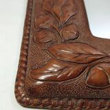 Espejo de pared de cuero. España, 1970s.