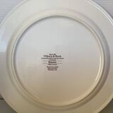 Set of three flat plates with botanical flowers by Villeroy & Boch.