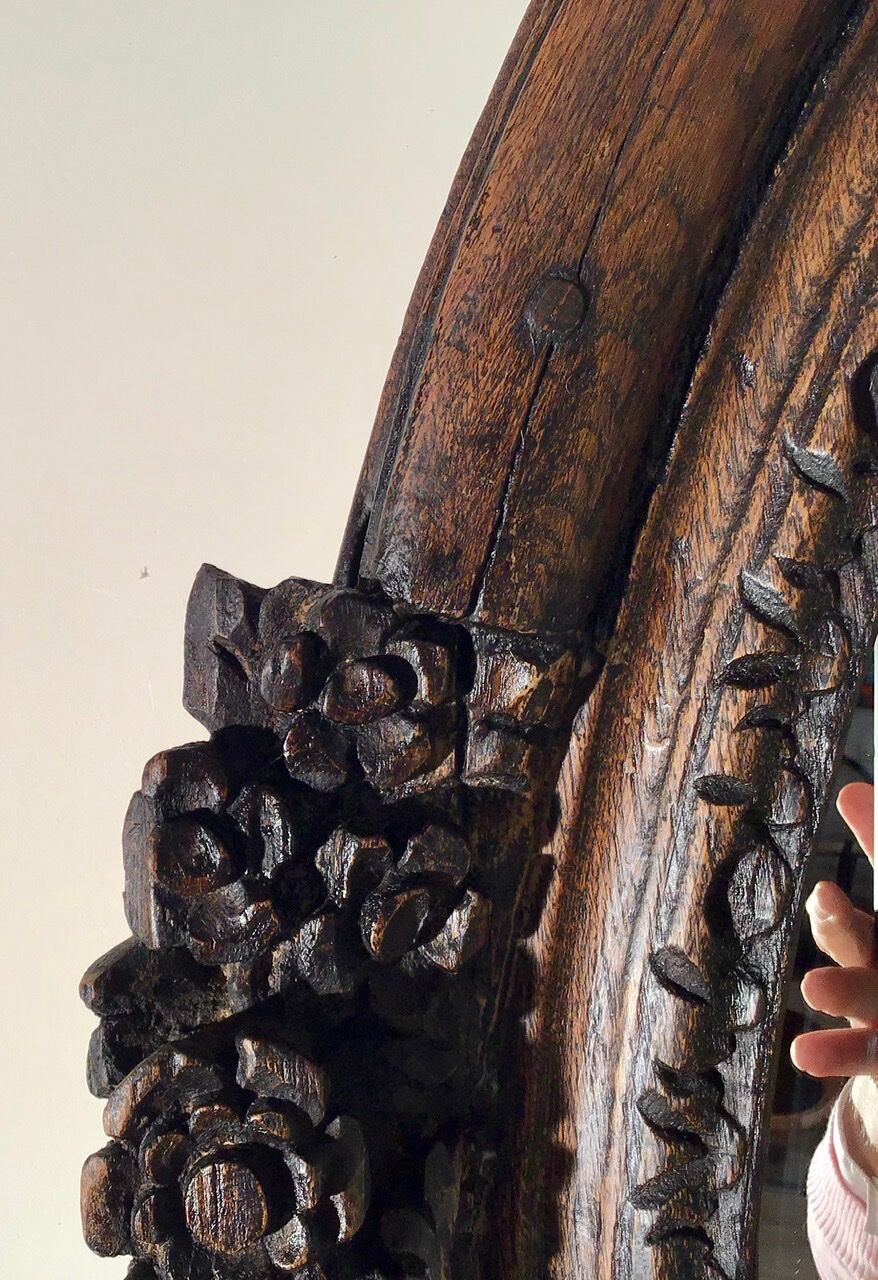 Oval mirror on an 18th century frame