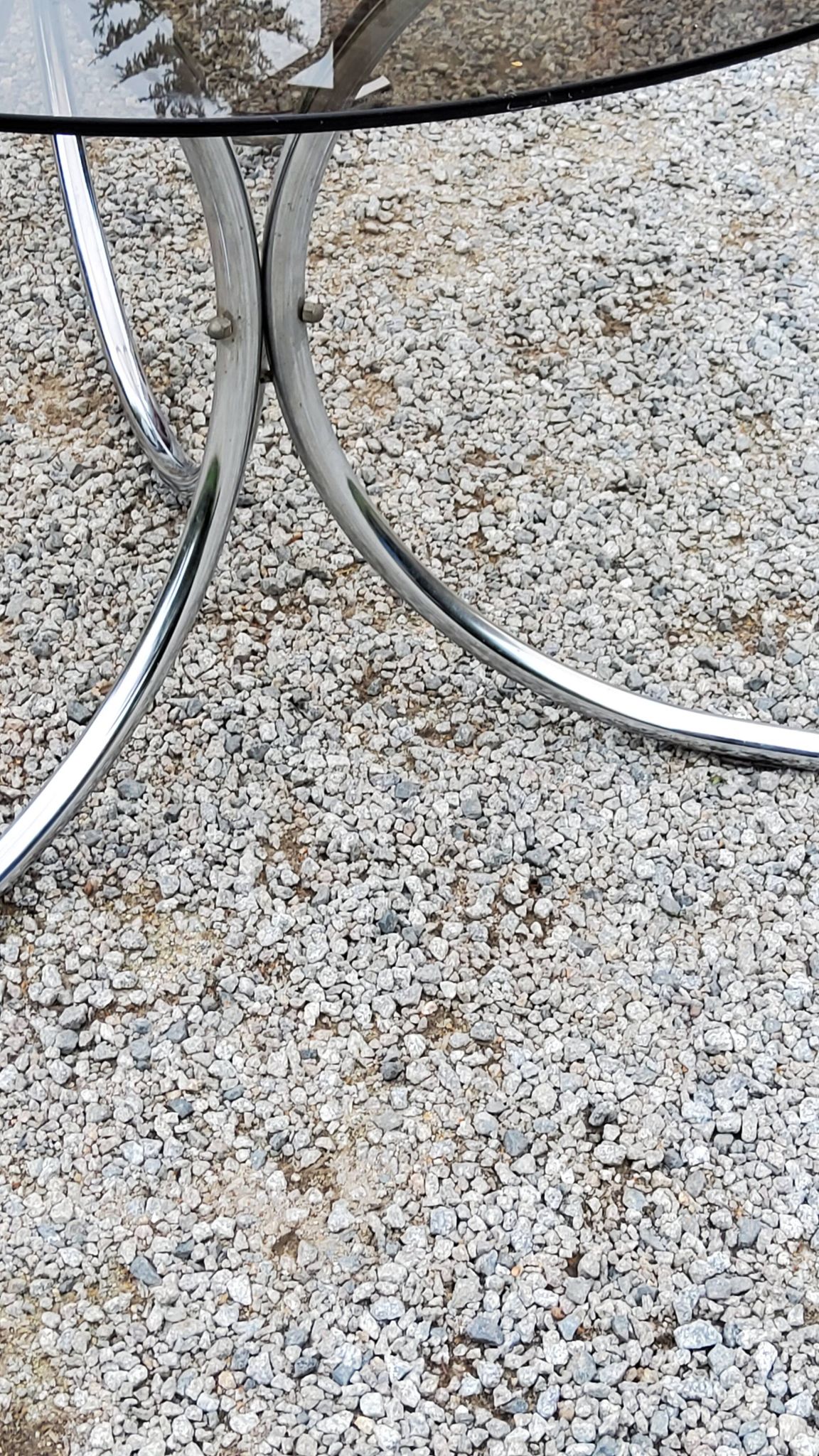 Dining table from the 70s top smoked glass base chrome