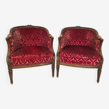 Pair of Transition period armchairs, trimmed with burgundy velvet