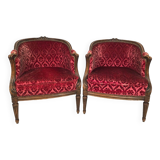 Pair of Transition period armchairs, trimmed with burgundy velvet