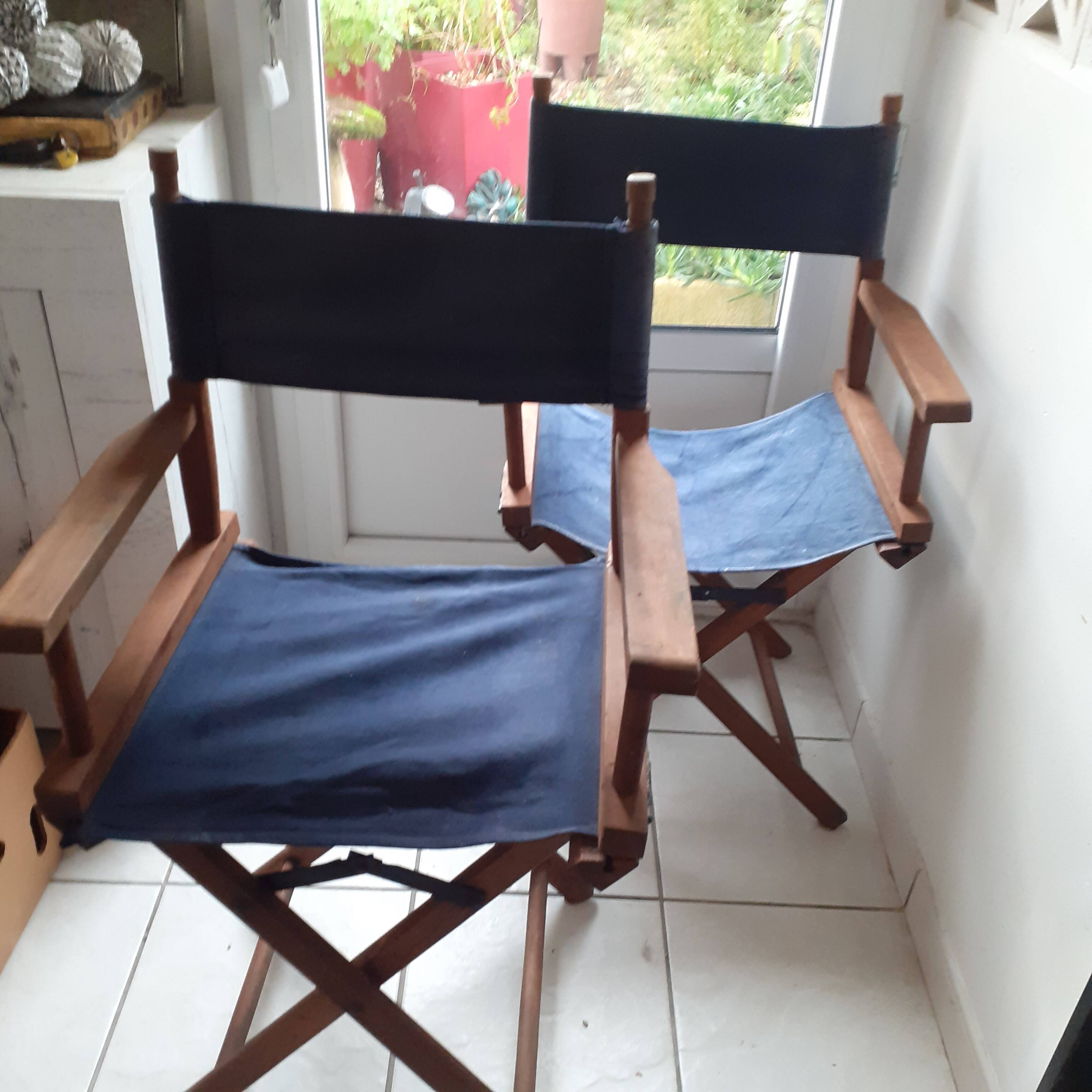 2 old director’s armchairs.