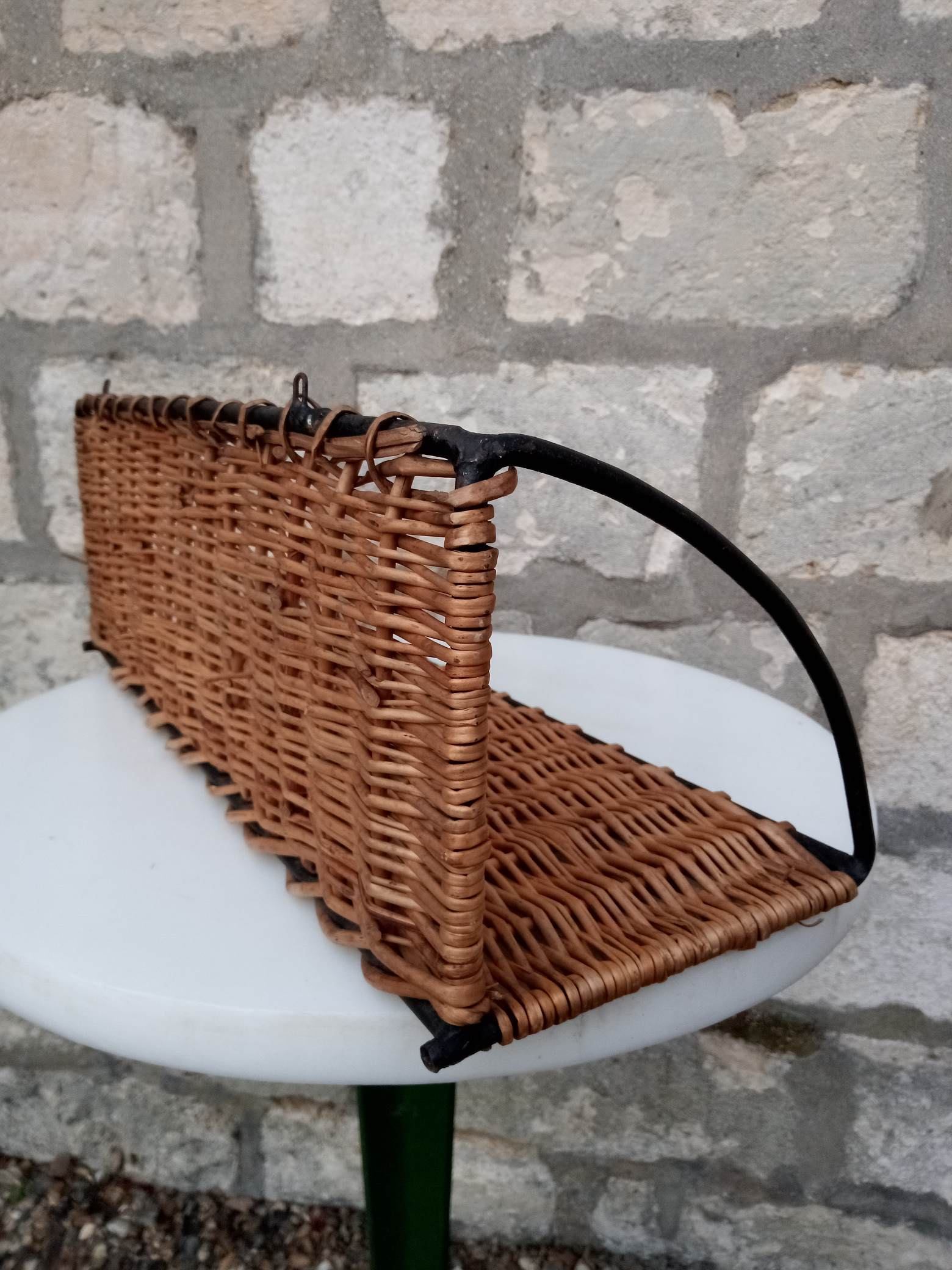 Rattan and steel shelf