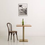 Square bistro table with solid walnut top and brass base