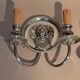 Pair of two-armed silver-plated bronze wall lights from Maison Charles, 1960.