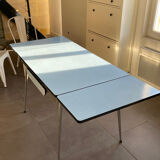 Blue Formica table for 4 to 6 people