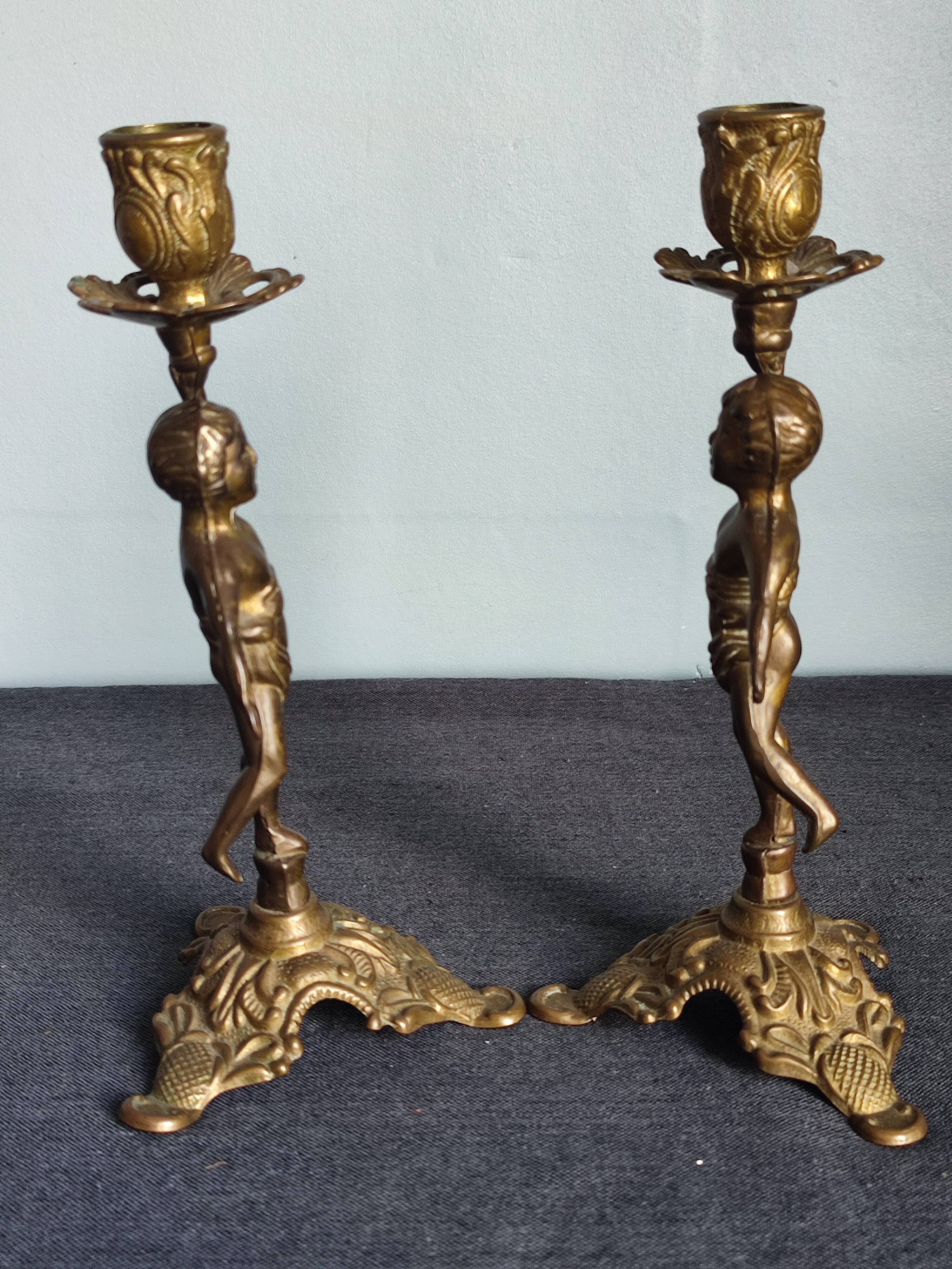 Set of two cherub cherub candlesticks
