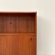 Vintage wooden cabinet with sliding doors