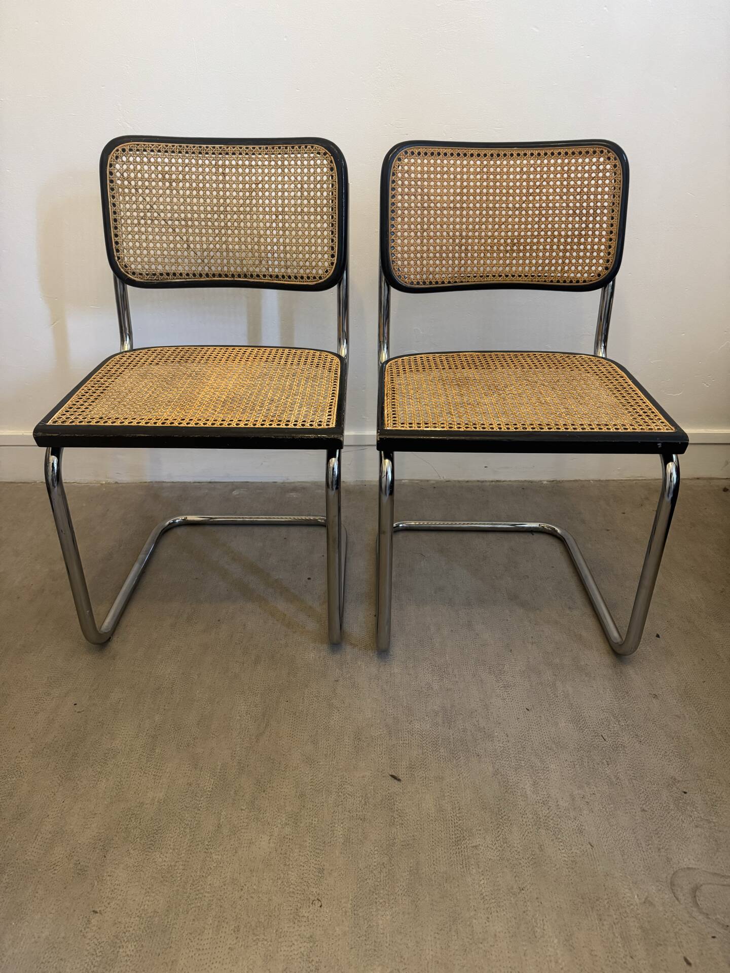 Pair of Marcel Breuer B32 Cesca chairs made in Italy.