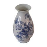 Blue vase adorned with blue and white