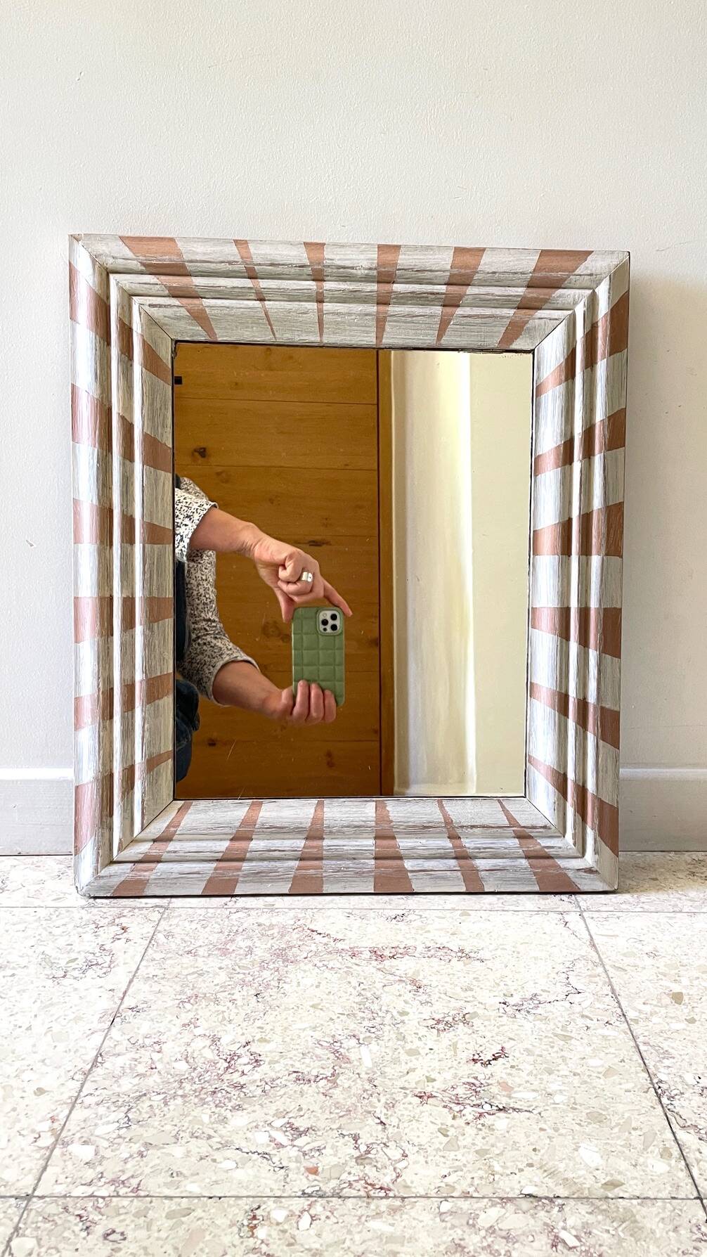 Old mirror in hand-painted wood