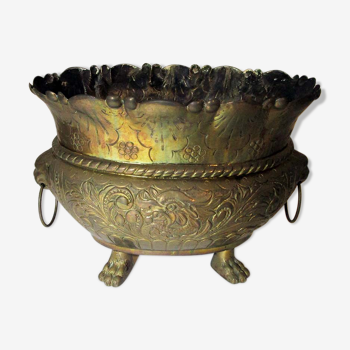 Brass pot cover with lion heads