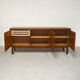 Row 3 doors clear teak, 1960