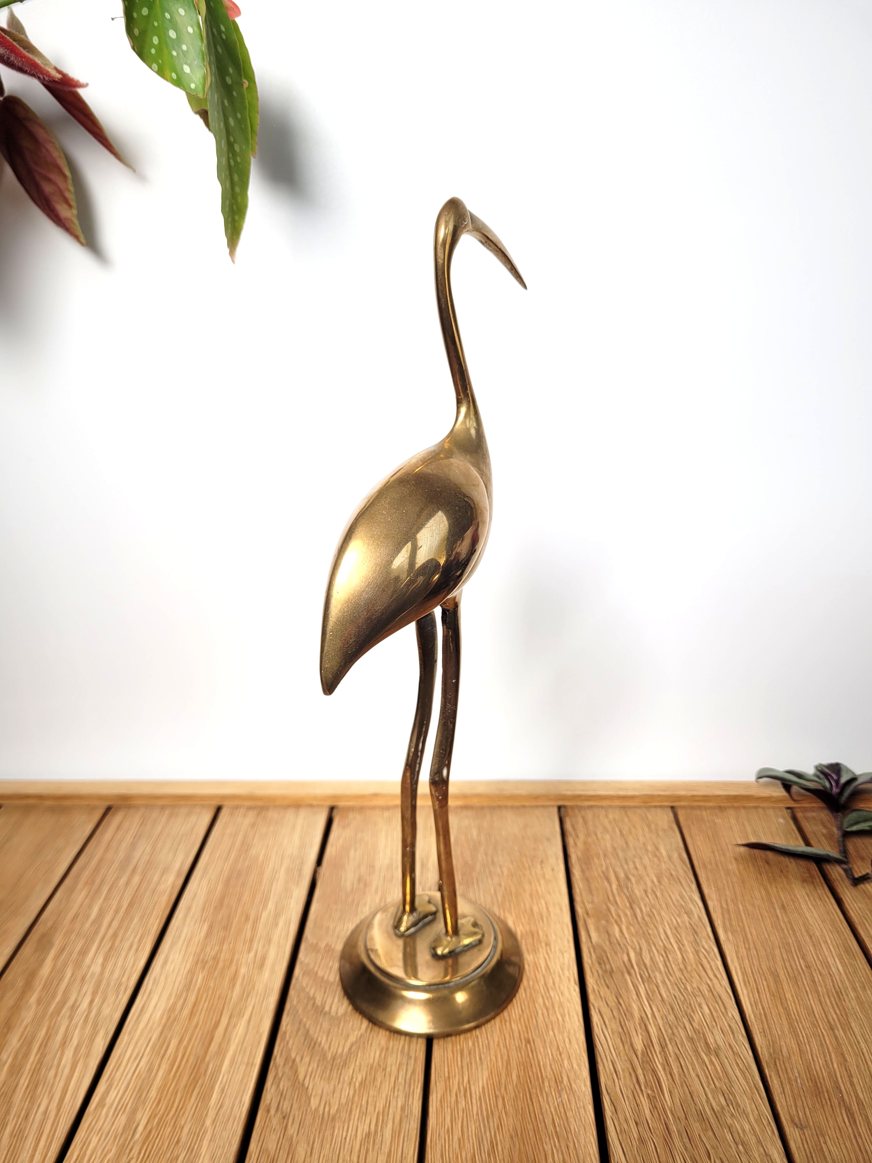 Golden brass blue heron