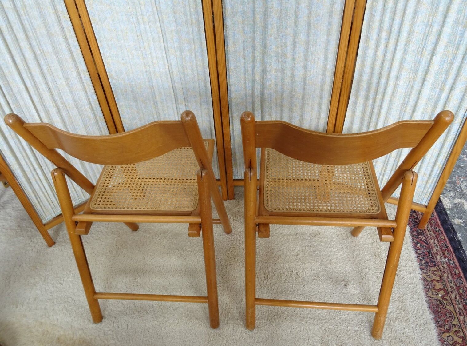 Pair of canned folding chairs