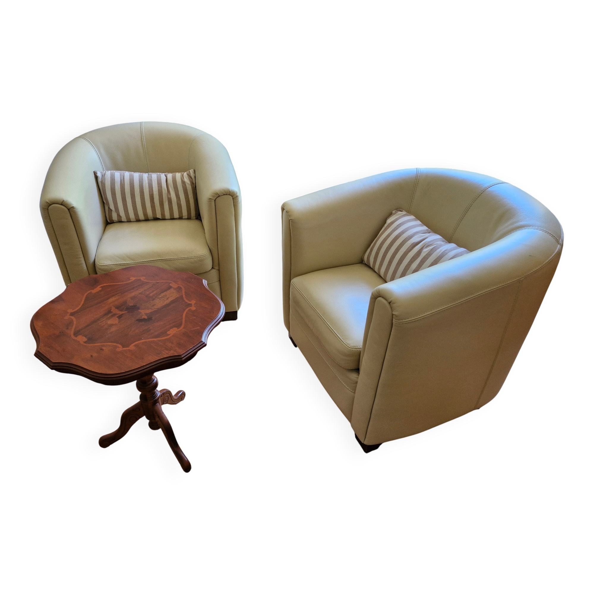A pair of genuine leather club armchairs.