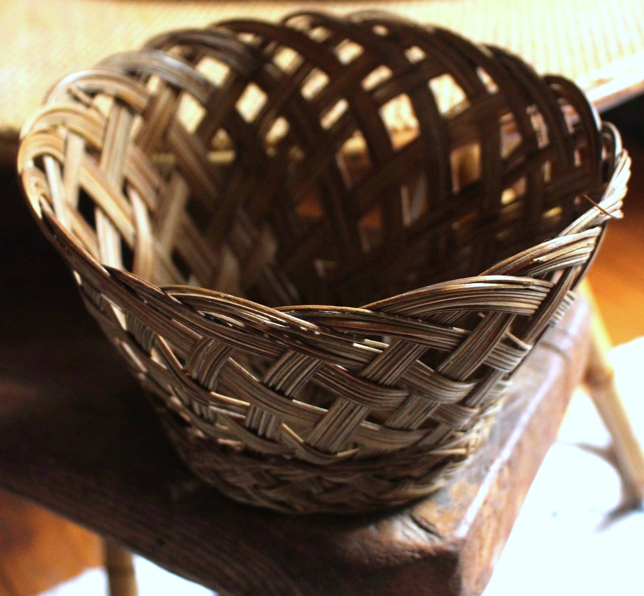 Vintage high round wicker basket with openwork.