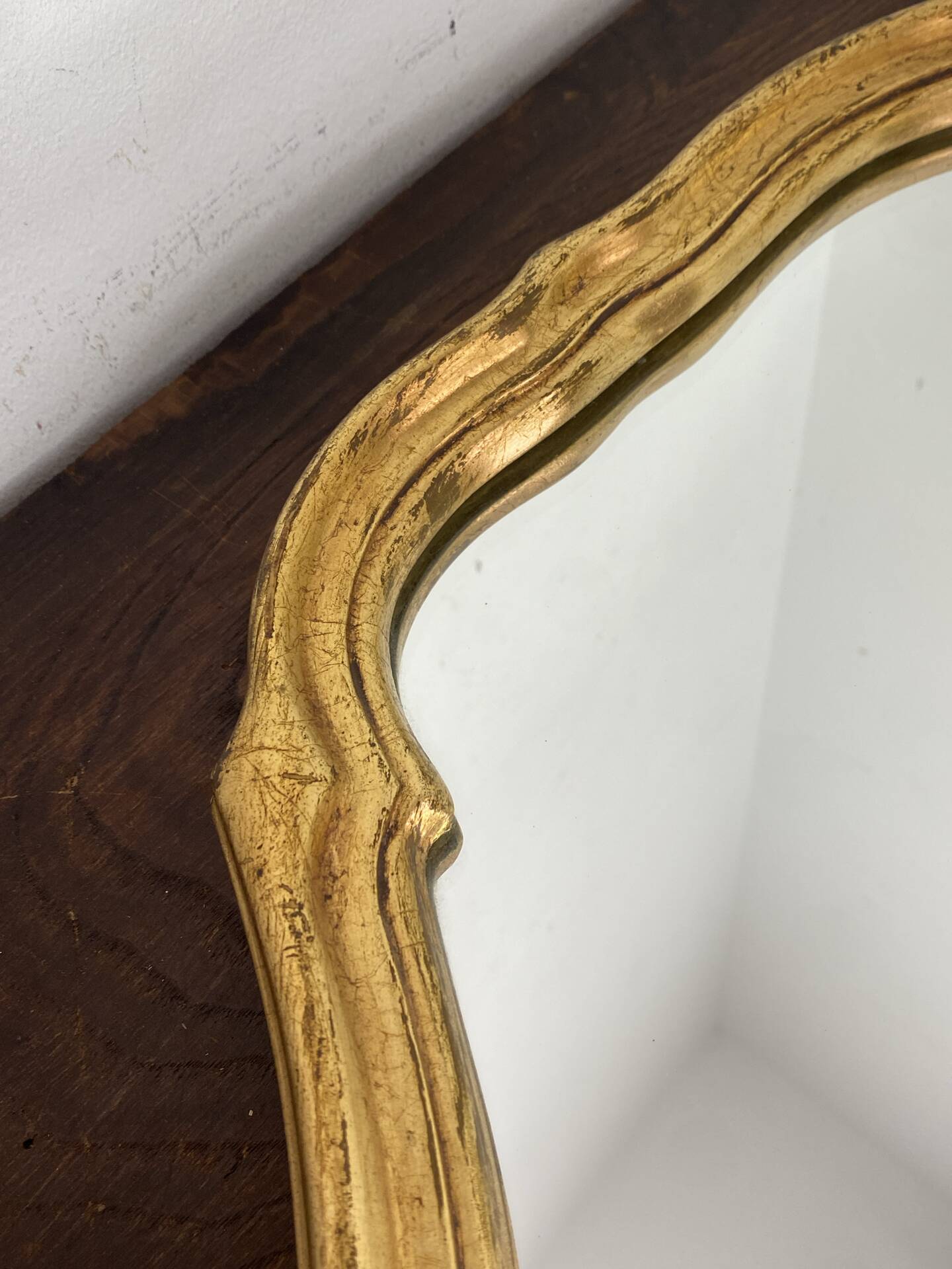 Large baroque mirror in gilded wood
