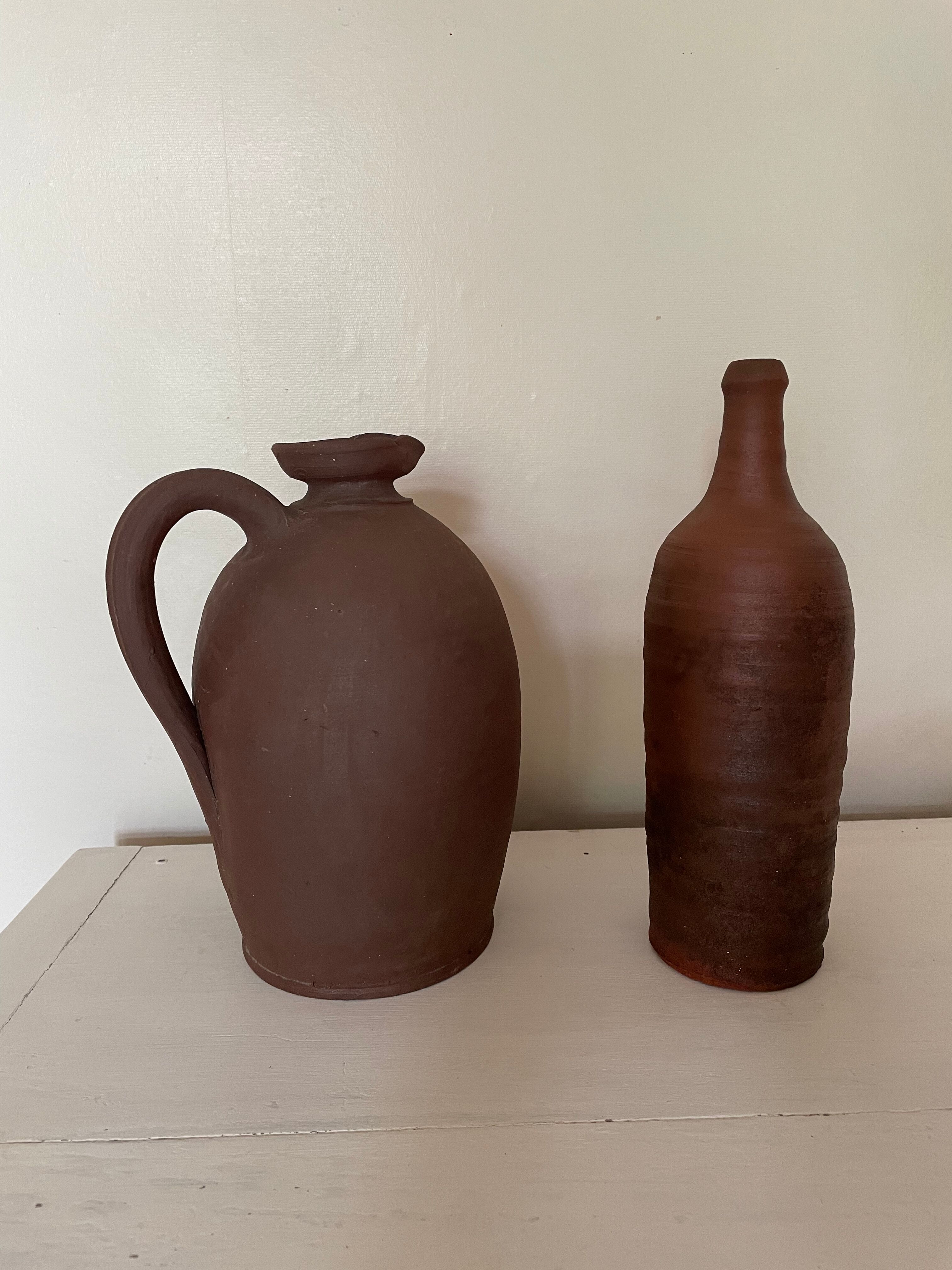 Jar and terracotta bottle