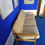 Scandinavian sofa in wood and vintage fabric from the 60s