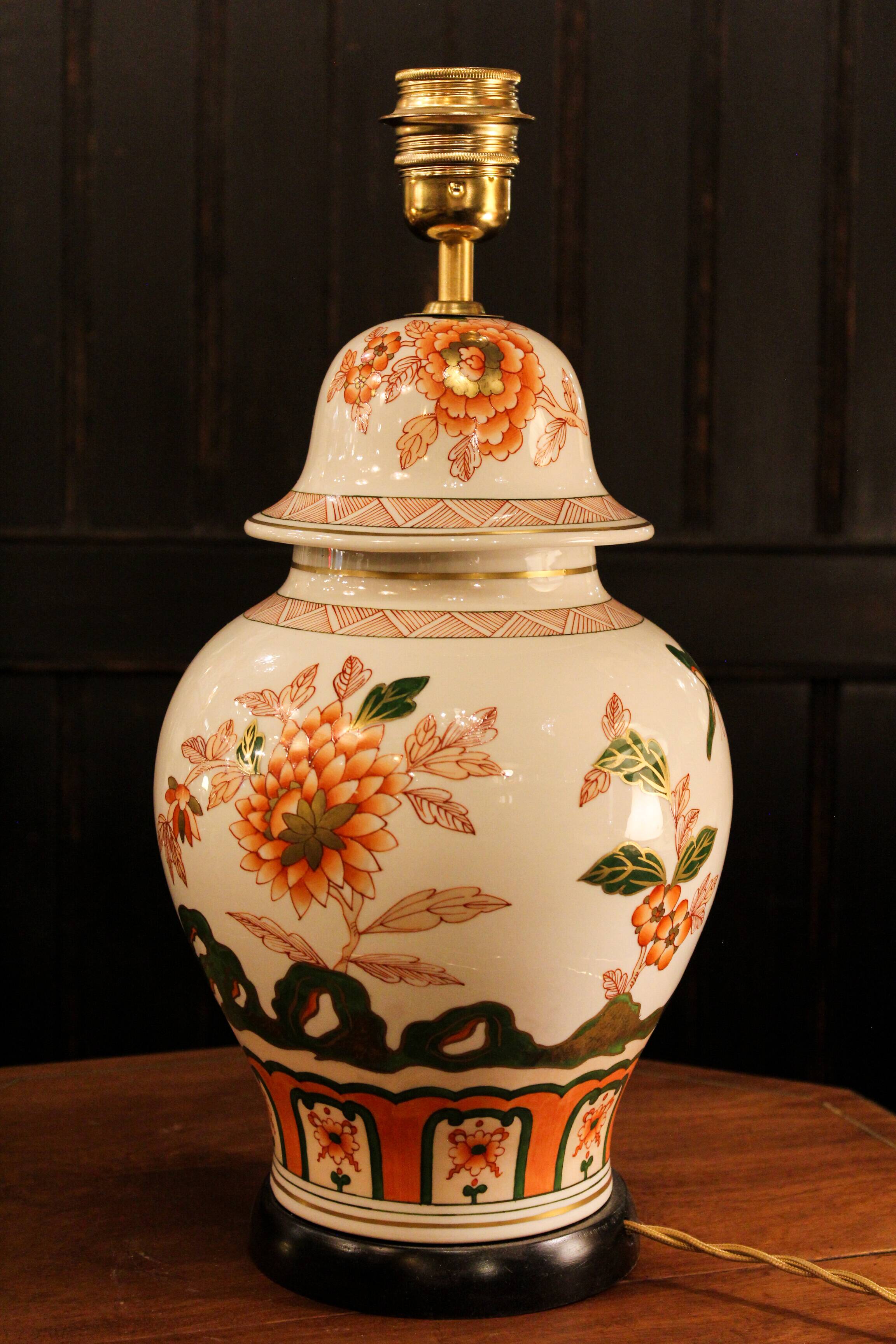 Spanish porcelain lamp hand-painted with floral patterns.