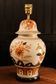 Spanish porcelain lamp hand-painted with floral patterns.