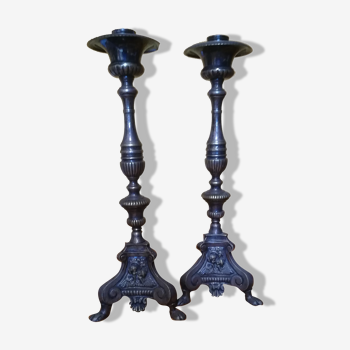 Pair of silver religious candle holders