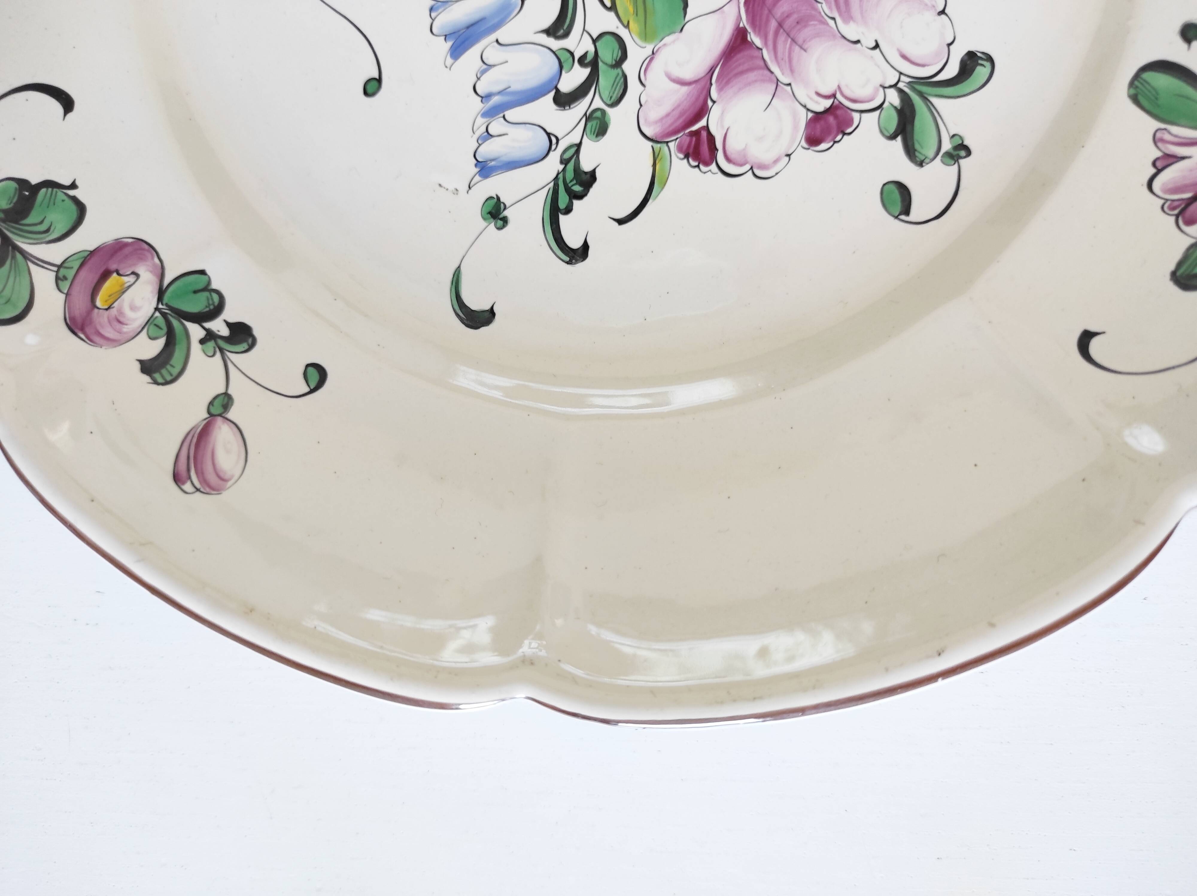 Eastern earthenware plate with flowers