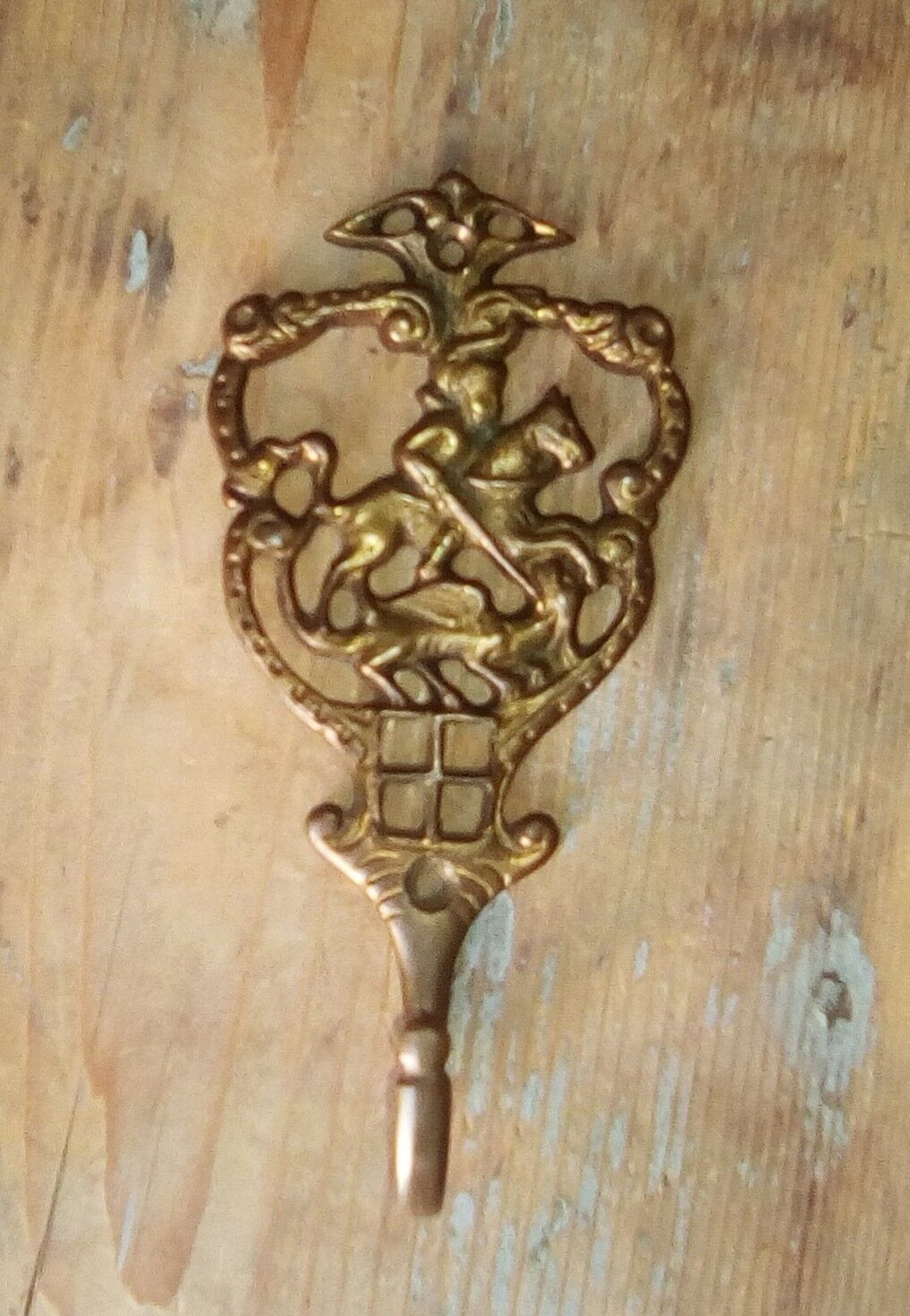 Old brass patère coat rack