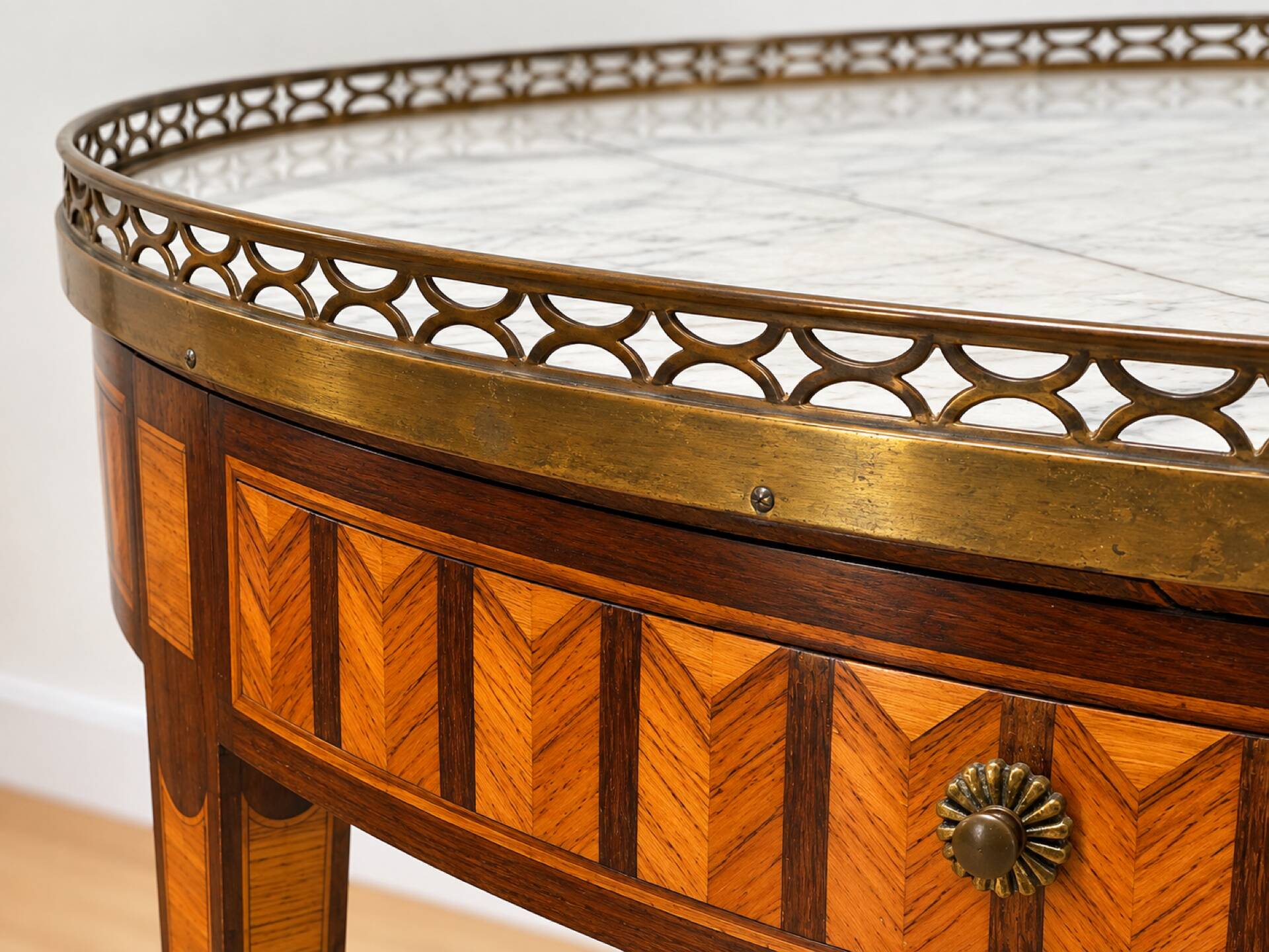 Bouillotte table in Louis XVI style with marquetry, marble, and brass.