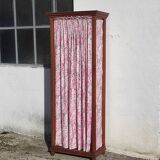 Old wardrobe in old wood and vintage fabric