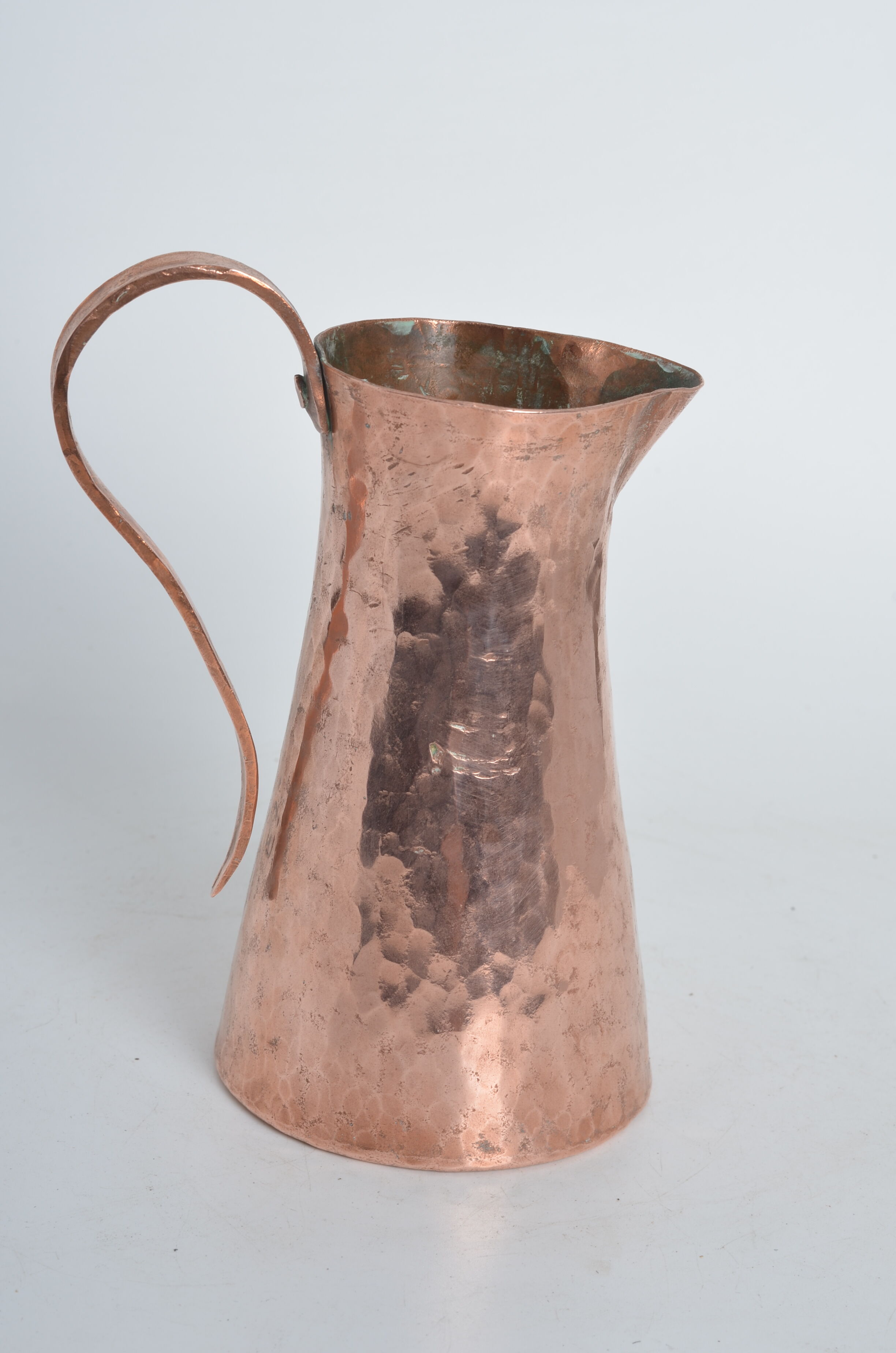 Hammered pink copper pitcher