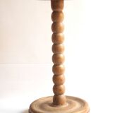 Beaded wood pedestal table