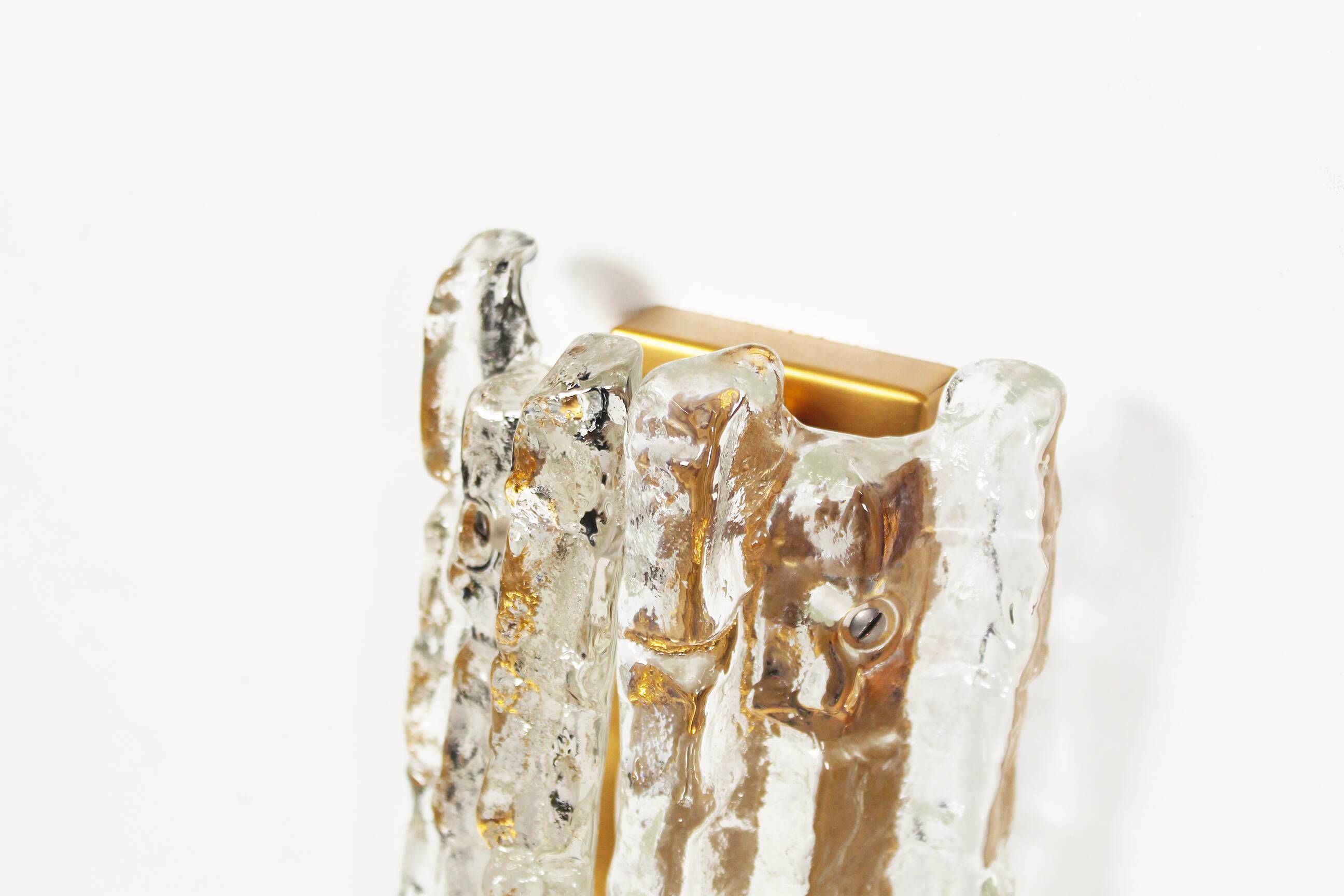 Set of two brass and heavy ice glass sconces by Kalmar, Austria 1970’s
