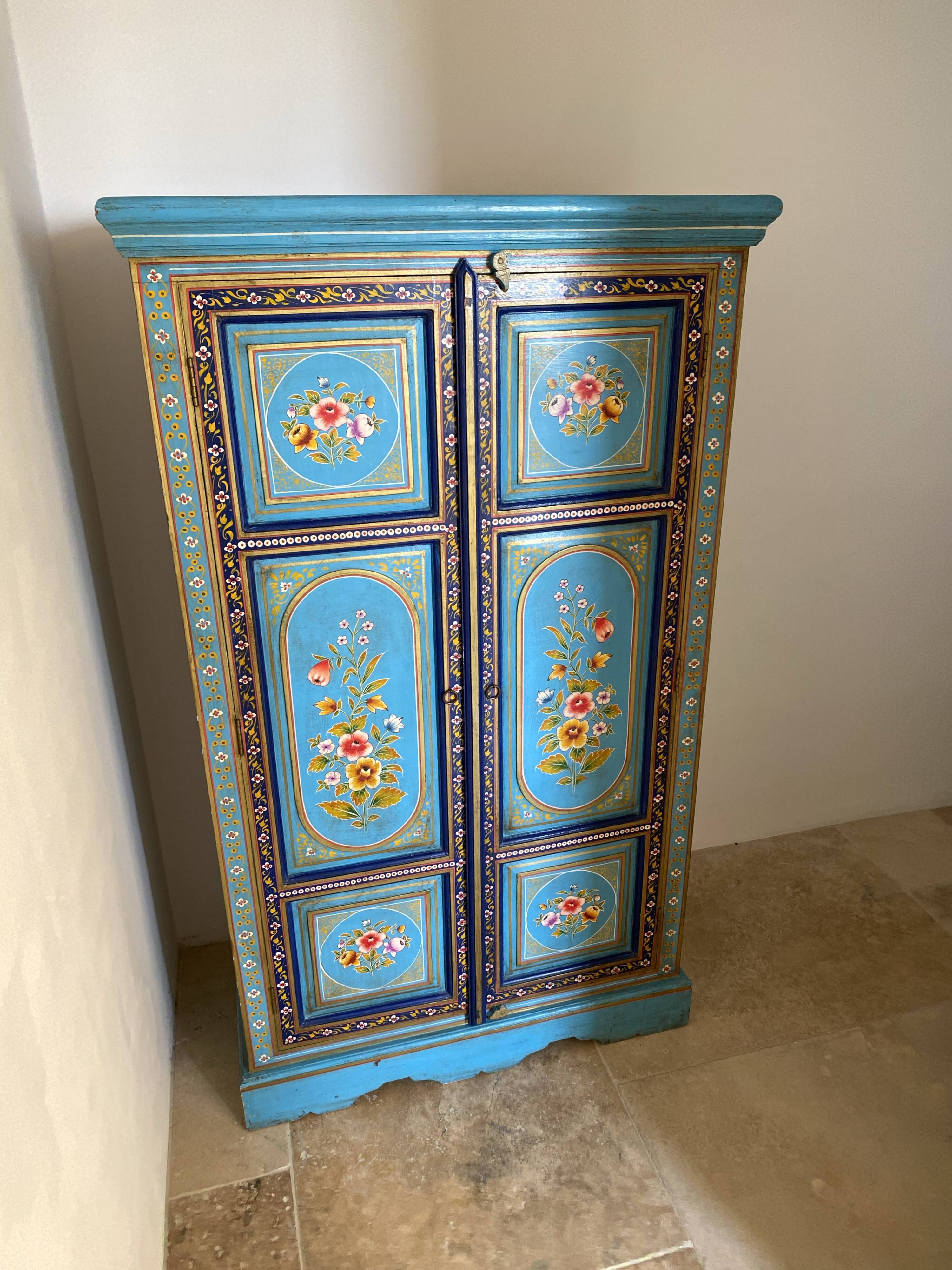 Painted cabinet with floral decoration
