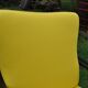 Art Deco armchair in yellow and black, made of painted wood and cotton, high back, 1920s.