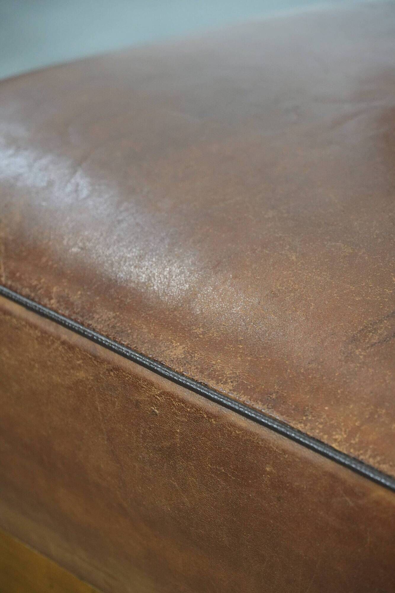Vintage design armchair / cocktail chair made of sheepskin leather