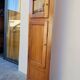 Corner glazed corner cabinet in old cherry wood 1900s