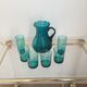 Orangeade  serving pitcher and 6 glasses 60