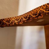 Console covered in velvet to hang