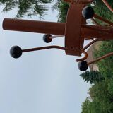 Vintage red industrial coat rack in cast iron, 1950s style, tripod base.