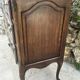 Carved and moulded solid wood commode in the Louis XV style.
