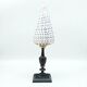 Coquillage conus sur socle en bois noirci, XIXe