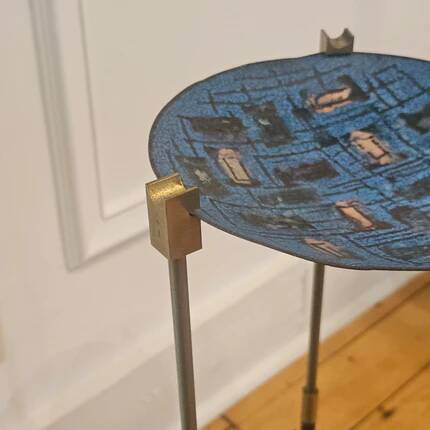 Vintage tripod metal side table with a blue brass bowl.